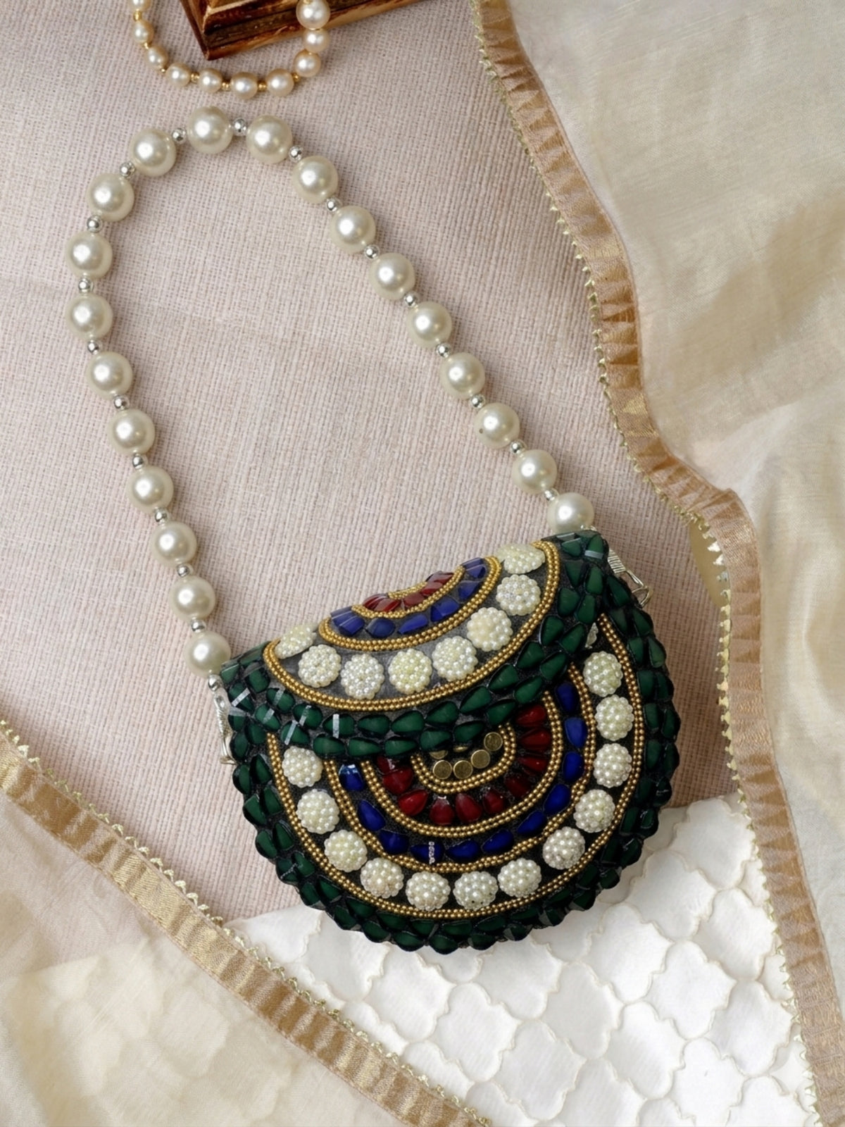 Metal Mirage Concentric Motif Embellished Clutch